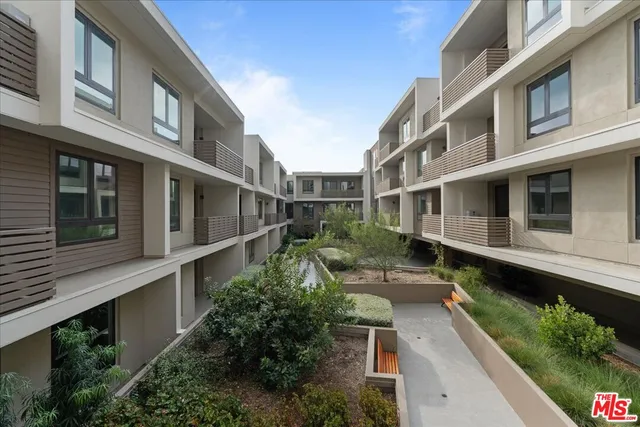 a view of a large building with many windows