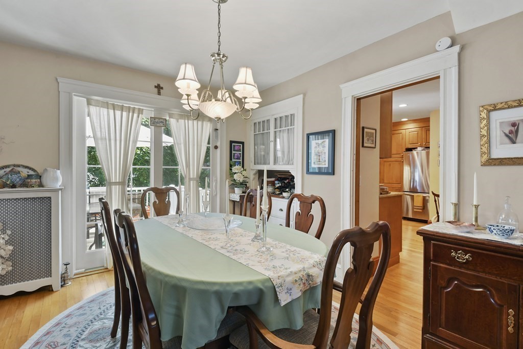 41 Peirce Street Arlington, MA 02476 - Photo 12 of 32 a view of a dining room with furniture window and wooden floor