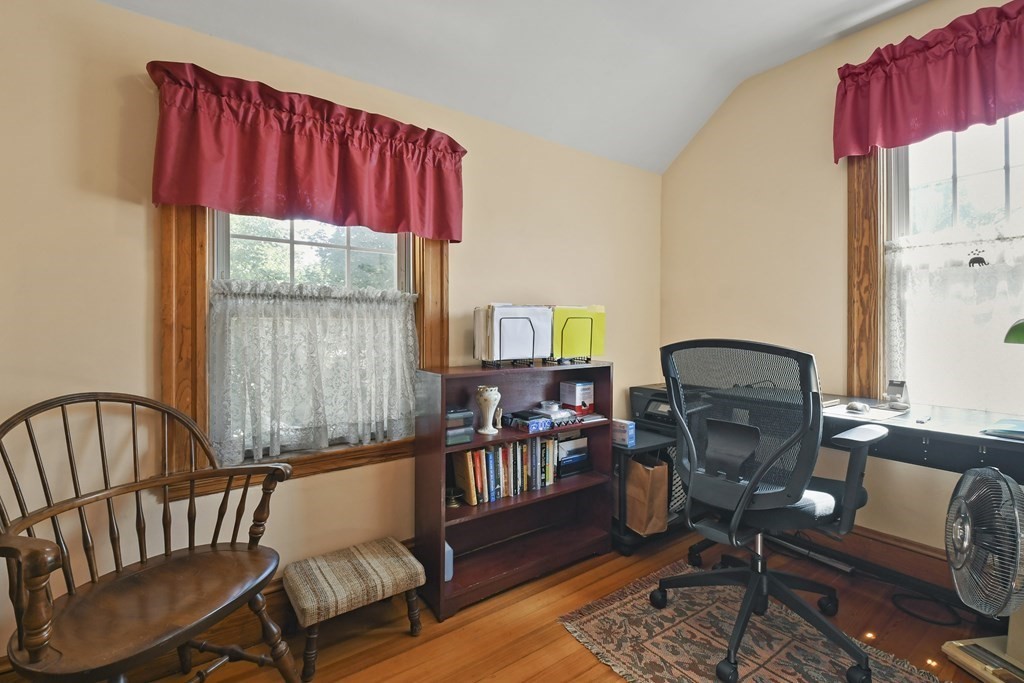 41 Peirce Street Arlington, MA 02476 - Photo 22 of 32 a living room with furniture and a window