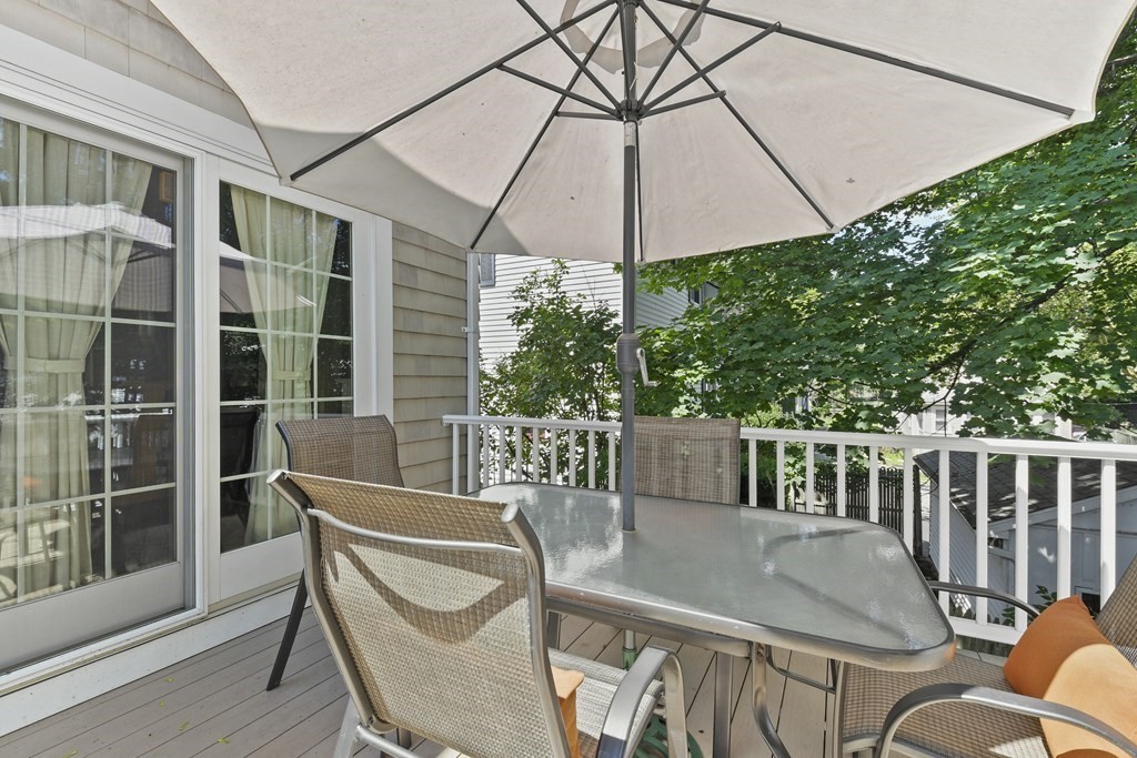 41 Peirce Street Arlington, MA 02476 - Photo 24 of 32 a view of a patio in the backyard