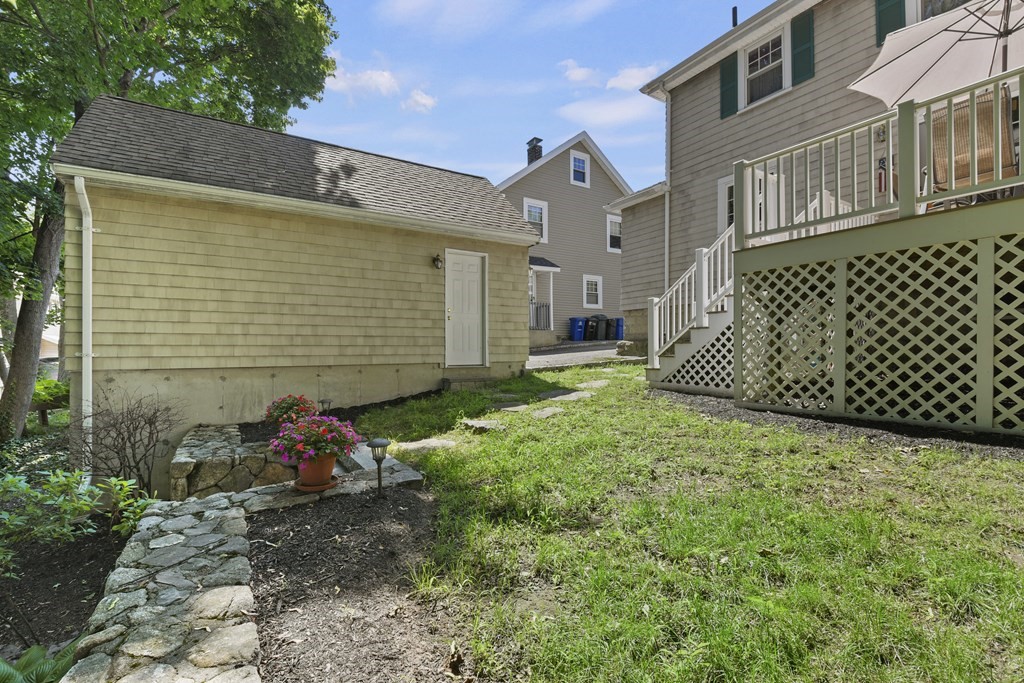 41 Peirce Street Arlington, MA 02476 - Photo 27 of 32 a view of a house with a backyard
