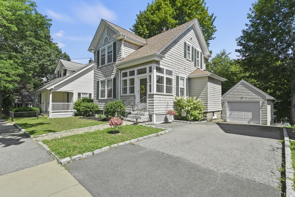 41 Peirce Street Arlington, MA 02476 - Photo 3 of 32 a front view of house with yard and green space