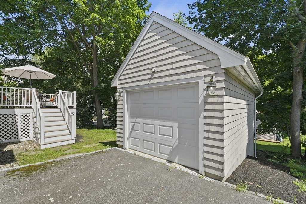 41 Peirce Street Arlington, MA 02476 - Photo 32 of 32 a view of a house with a yard and garage