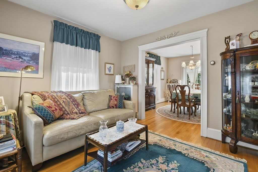 41 Peirce Street Arlington, MA 02476 - Photo 8 of 32 a living room with furniture and a rug