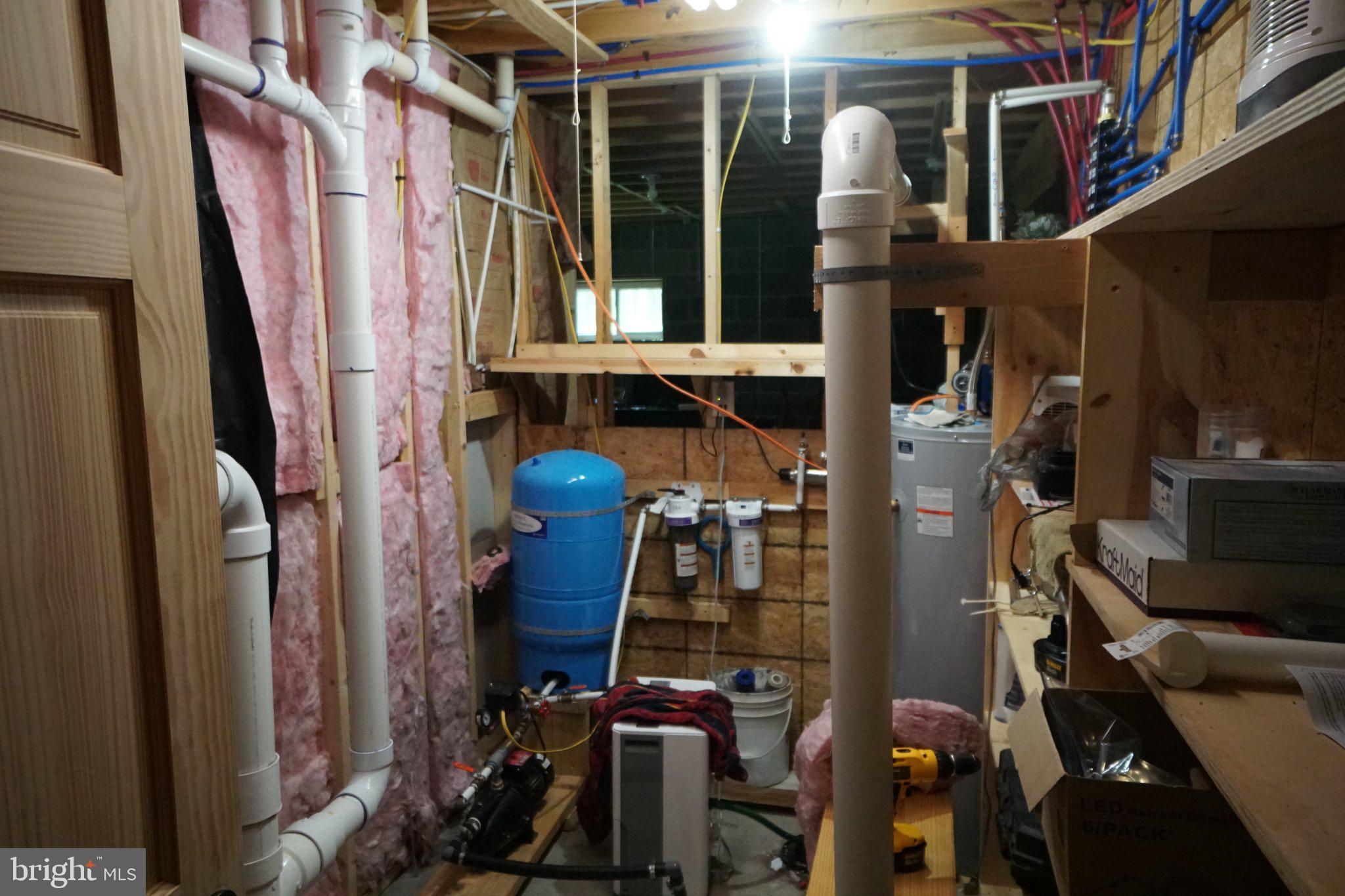 150 Sharp Ridge Lane Franklin, WV 26807 - Photo 55 of 69 Utility space with plumbing features.