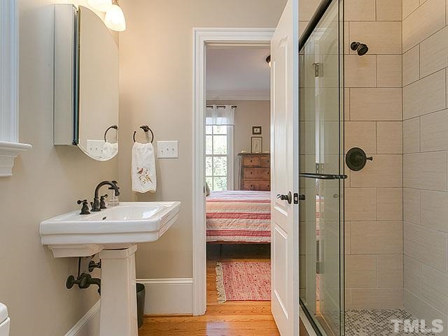 3052 Farrior Road Raleigh, NC 27607 - Photo 14 of 25 Lovely full bath with shower for the guest suite. First floor also has a half bath!