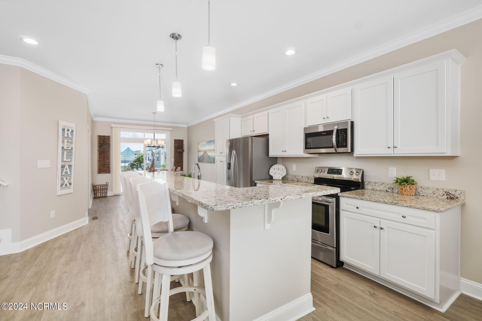 2800 West Fort Macon Road, Unit 16 Atlantic Beach, NC 28512 - Photo 16 of 62 Modern kitchen w/ island seating