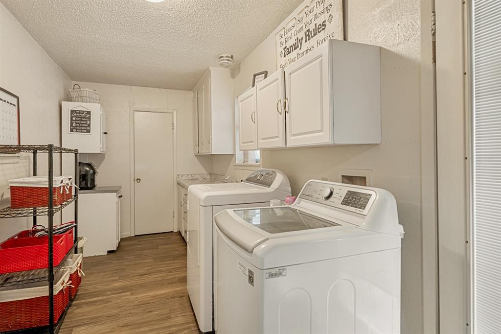 508 West 9th Street Kemp, TX 75143 - Photo 24 of 32 a utility room with dryer and washer