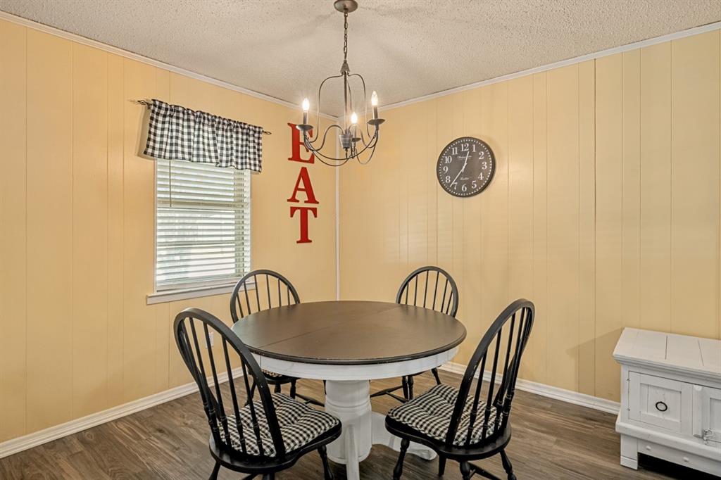 508 West 9th Street Kemp, TX 75143 - Photo 8 of 32 a dining room with furniture and window
