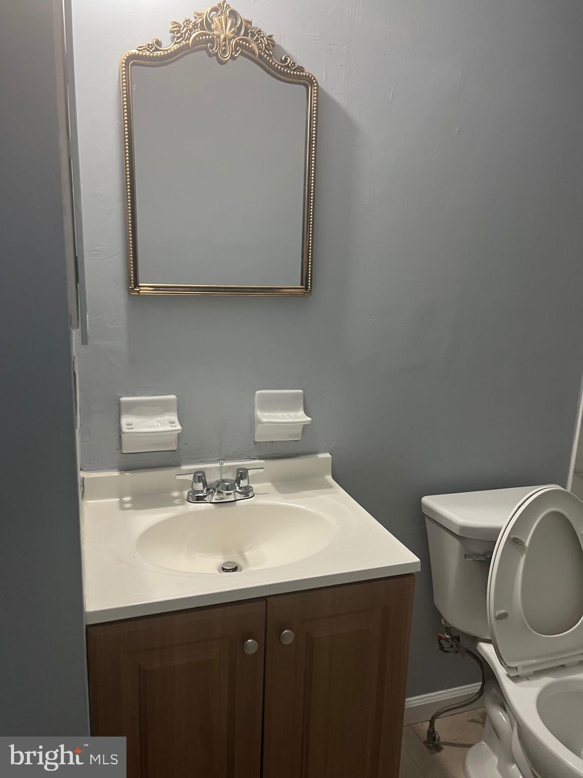 13 A Hampton Gate Drive Sicklerville, NJ 08081 - Photo 16 of 23 a bathroom with a sink mirror vanity and toilet