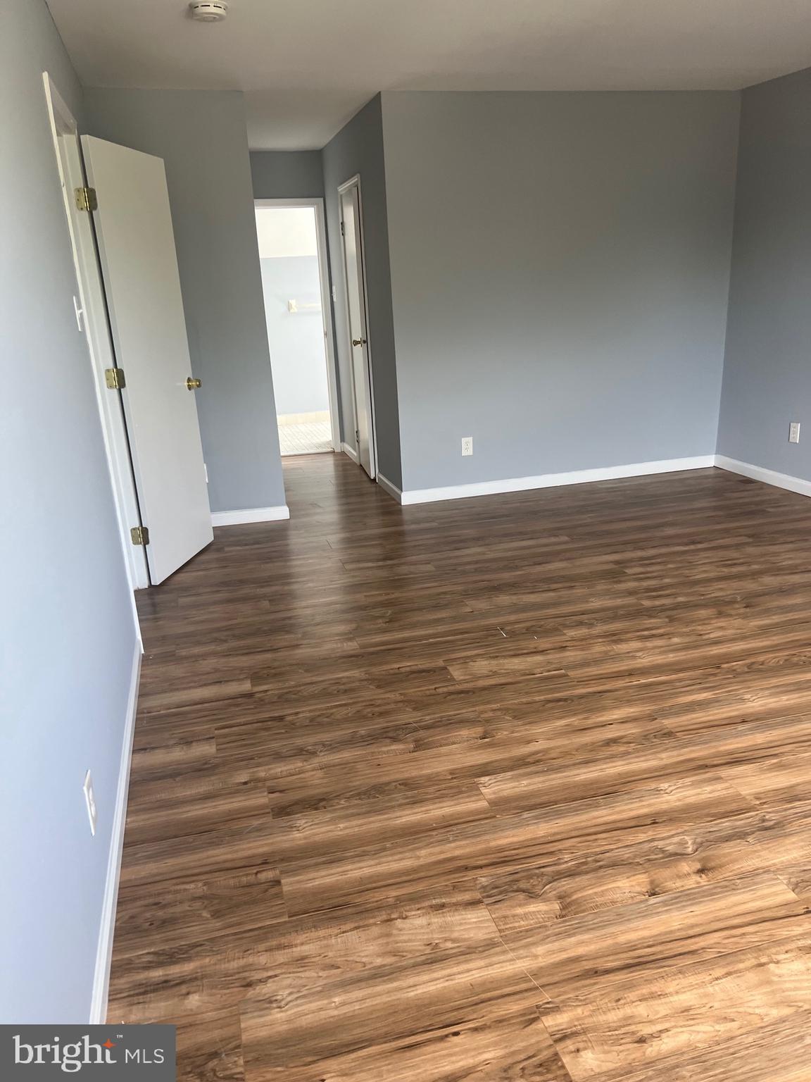 13 A Hampton Gate Drive Sicklerville, NJ 08081 - Photo 18 of 23 a view of a room with wooden floor