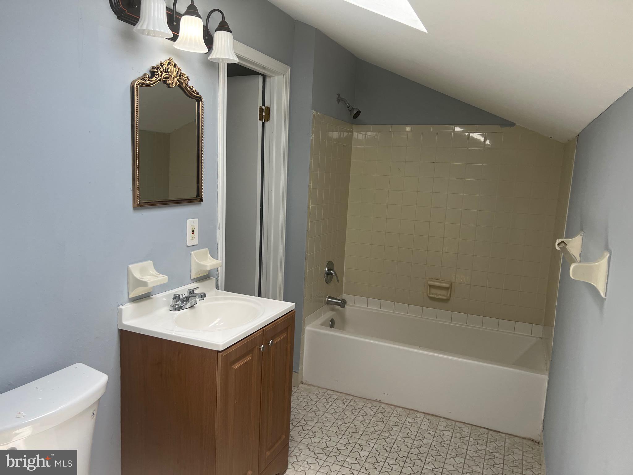 13 A Hampton Gate Drive Sicklerville, NJ 08081 - Photo 19 of 23 a bathroom with a sink and a mirror