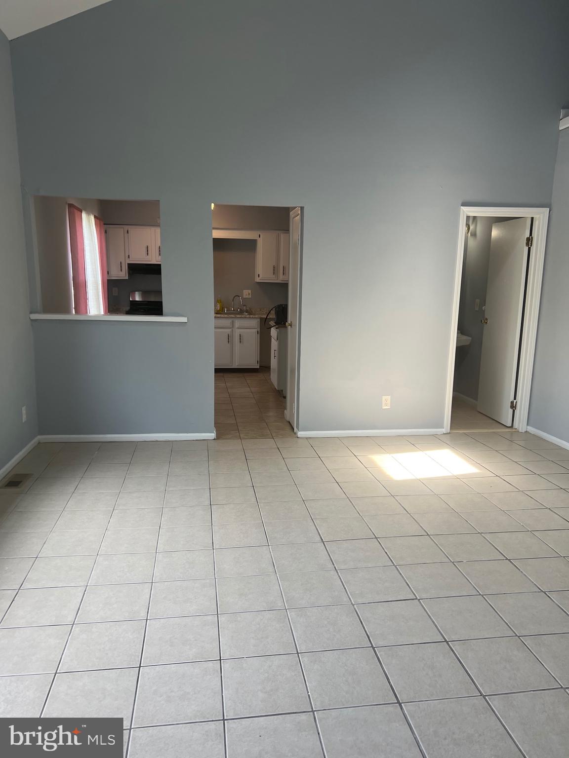 13 A Hampton Gate Drive Sicklerville, NJ 08081 - Photo 3 of 23 an empty room with windows