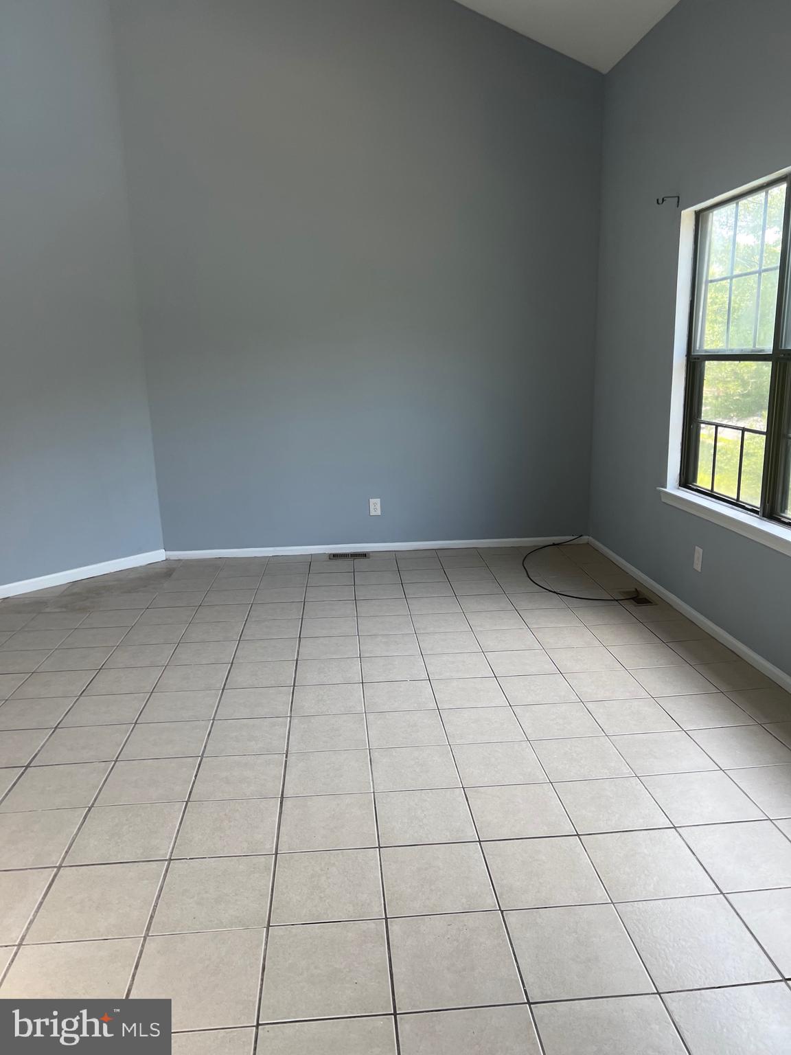 13 A Hampton Gate Drive Sicklerville, NJ 08081 - Photo 7 of 23 an empty room with white tiles