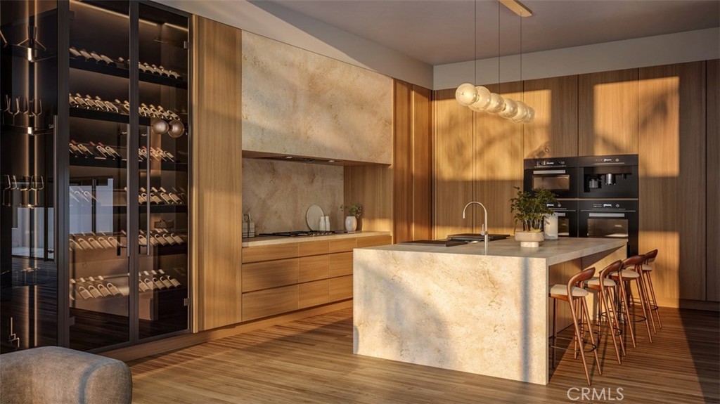 928 Emerald Bay Laguna Beach, CA 92651 - Photo 2 of 8 a living room with stainless steel appliances furniture a large window and a kitchen view