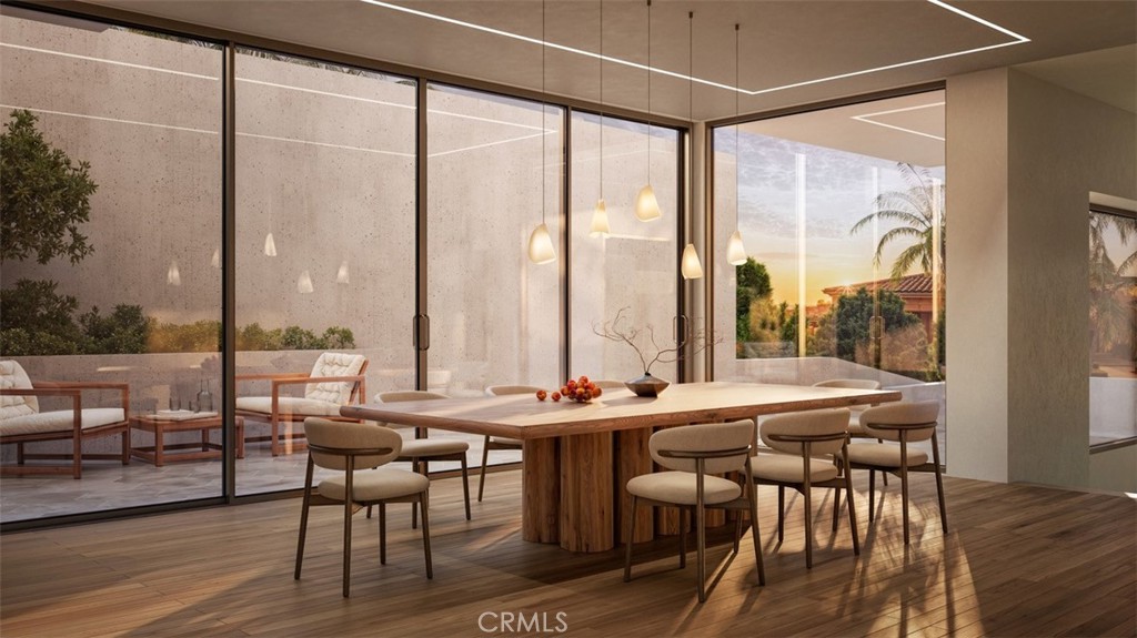 928 Emerald Bay Laguna Beach, CA 92651 - Photo 3 of 8 a room with lots of wooden furniture and glass windows