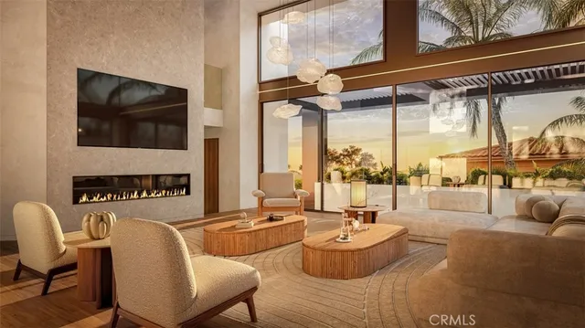 a living room with furniture a rug and a floor to ceiling window