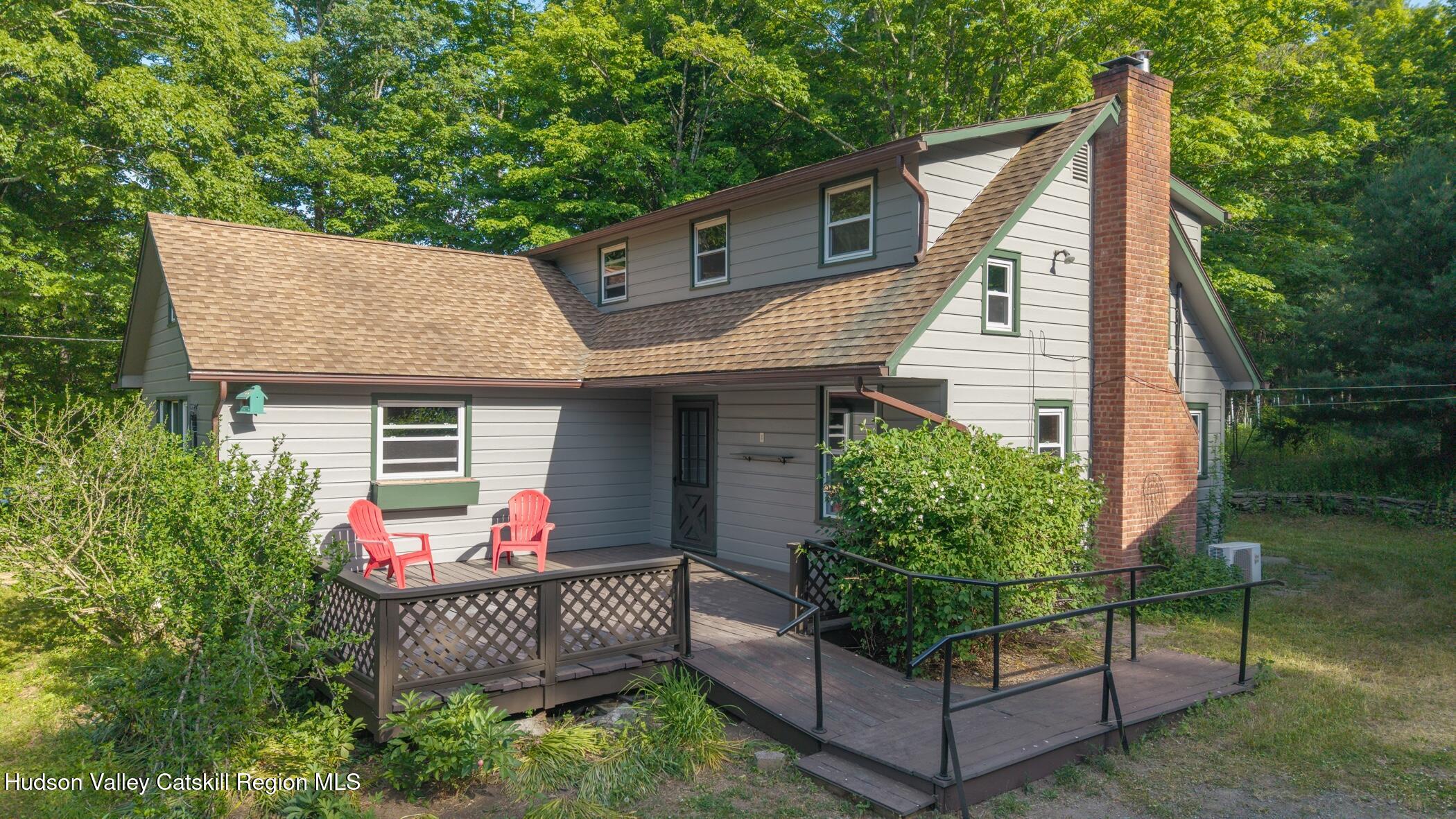4533 Atwood Road Stone Ridge, NY 12484 - Photo 54 of 63 front view of a house with a yard