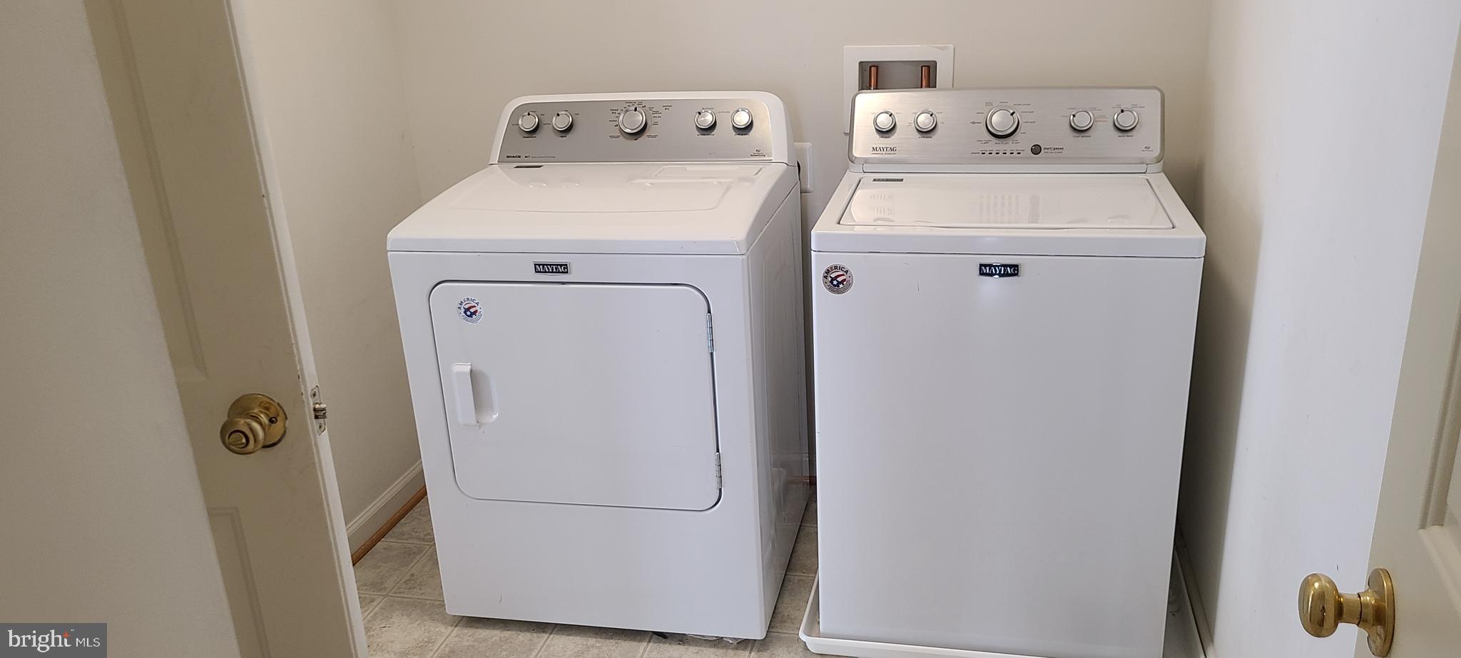 1028 Riverdale Circle Culpeper, VA 22701 - Photo 16 of 32 a utility room with dryer and washer
