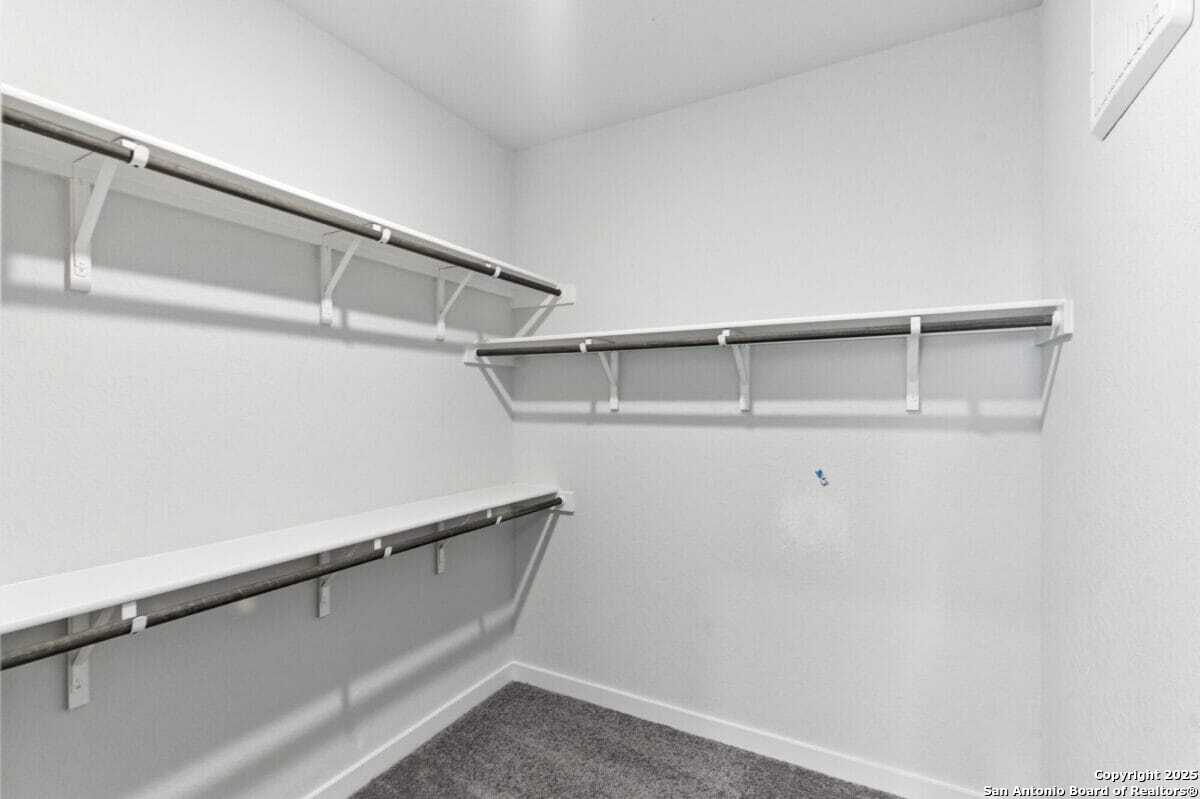 1896 Split Rock Road New Braunfels, TX 78130 - Photo 13 of 22 a view of an empty walk in closet
