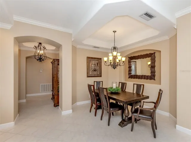 a view of swimming pool with outdoor seating and deck