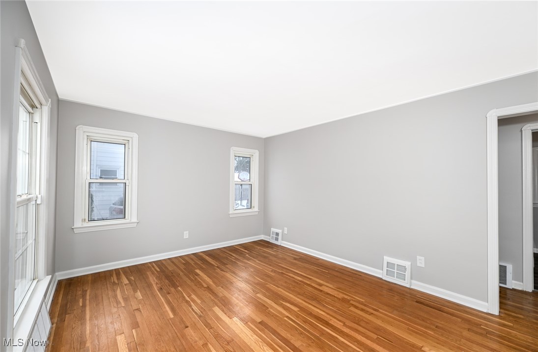1571 Lander Road Cleveland, OH 44124 - Photo 14 of 39 Unfurnished bedroom with light wood-style floors and baseboards