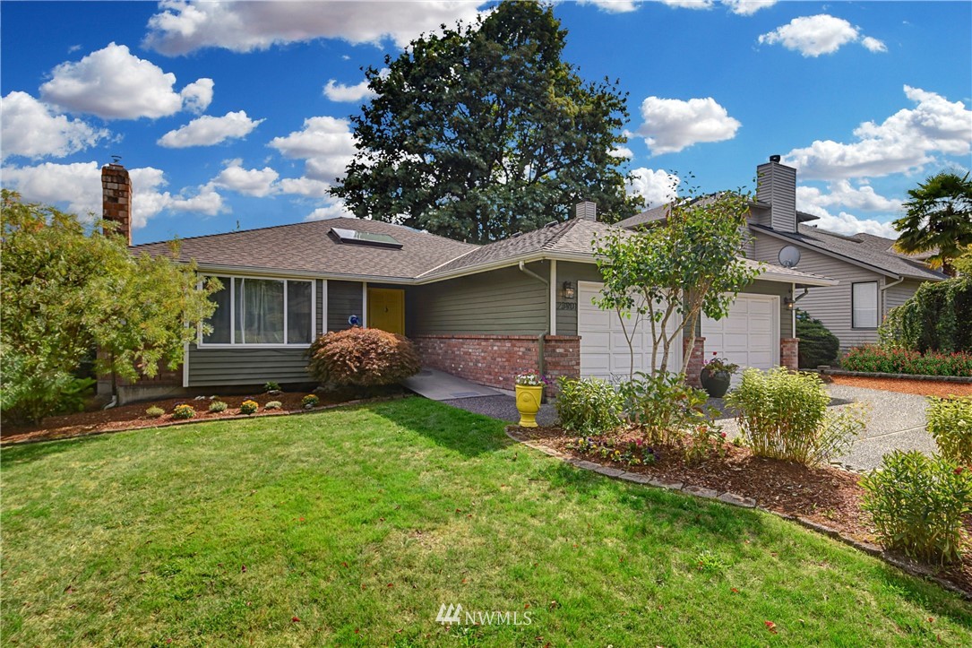 23901 23rd Drive Southeast Bothell, WA 98021 - Photo 2 of 27 a front view of a house with garden