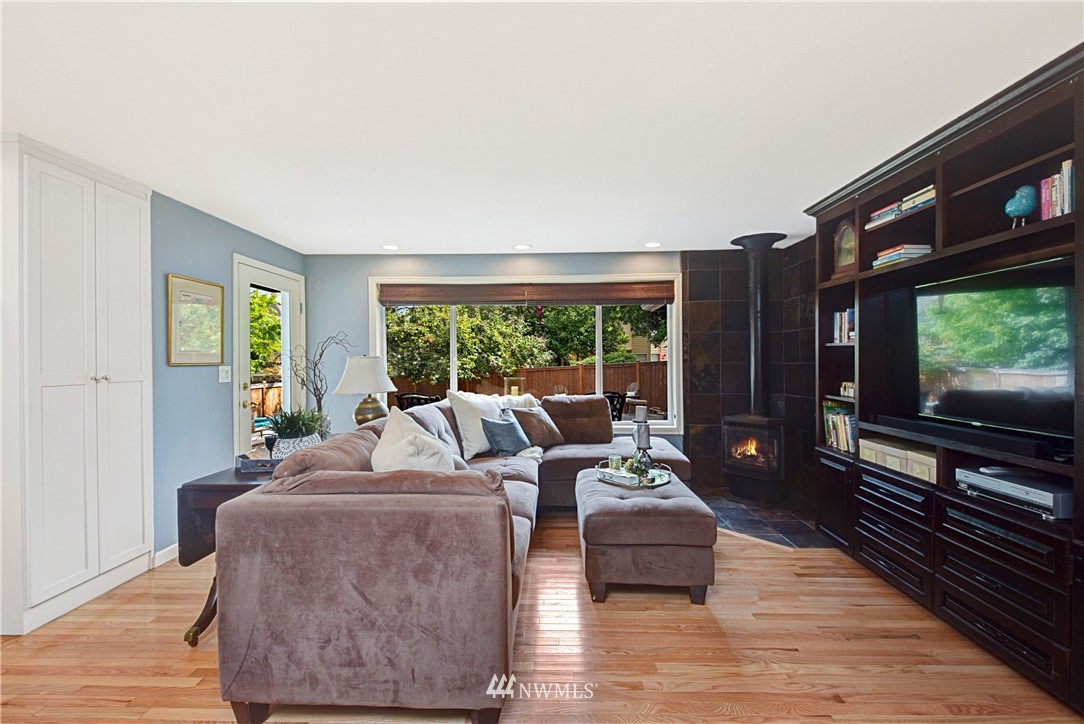 23901 23rd Drive Southeast Bothell, WA 98021 - Photo 13 of 27 a living room with furniture large windows and a flat screen tv
