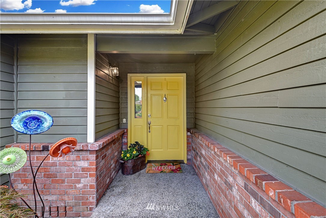 23901 23rd Drive Southeast Bothell, WA 98021 - Photo 3 of 27 a view of a door and chair in the balcony