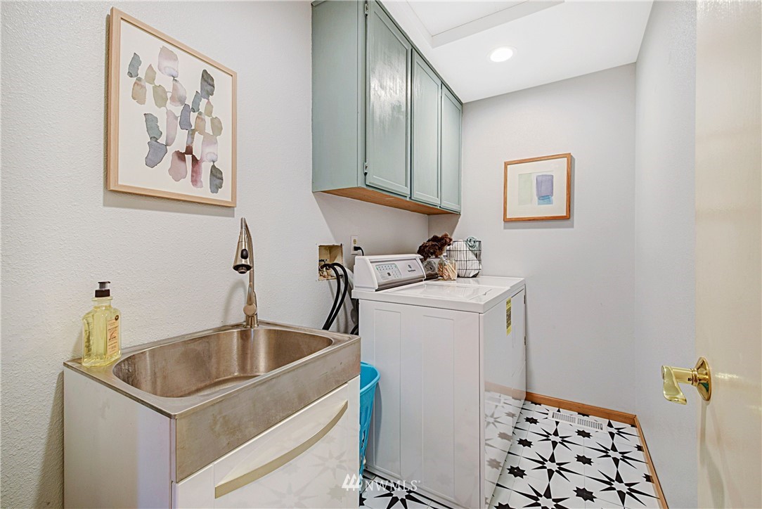 23901 23rd Drive Southeast Bothell, WA 98021 - Photo 23 of 27 a bathroom with a sink and a mirror