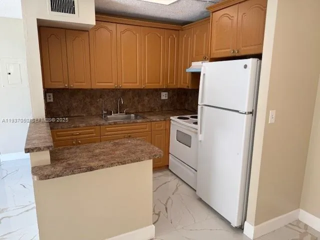 $2,100 | 425 Northwest 210th Street, Unit 101, Miami Gardens, FL 33169