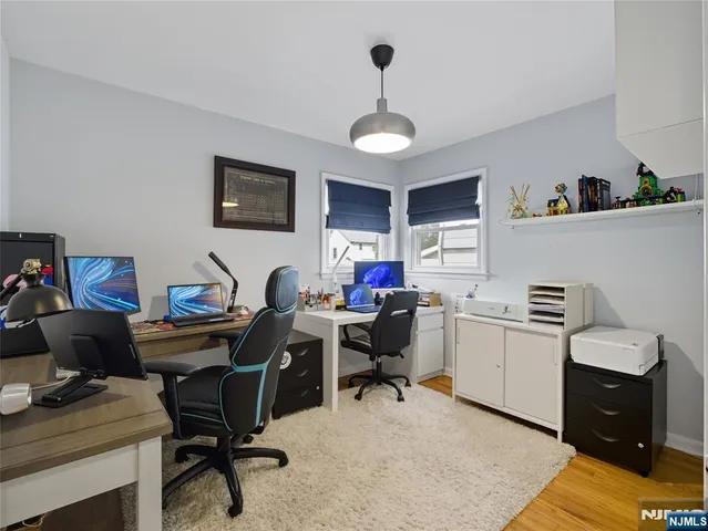 a view of a workspace with furniture