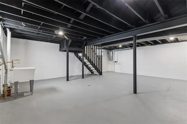 a view of an empty room with a garage