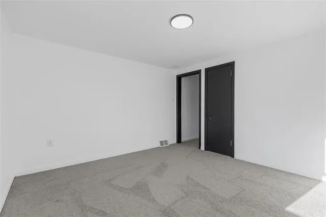 an empty room with an entryway