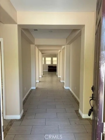 a kitchen with a cabinets and steel stove