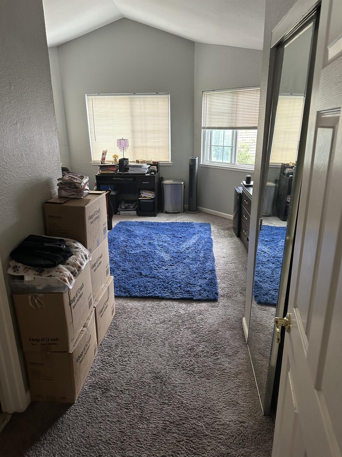 5723 Larcom Lane Stockton, CA 95210 - Photo 16 of 22 a living room with furniture and a fireplace