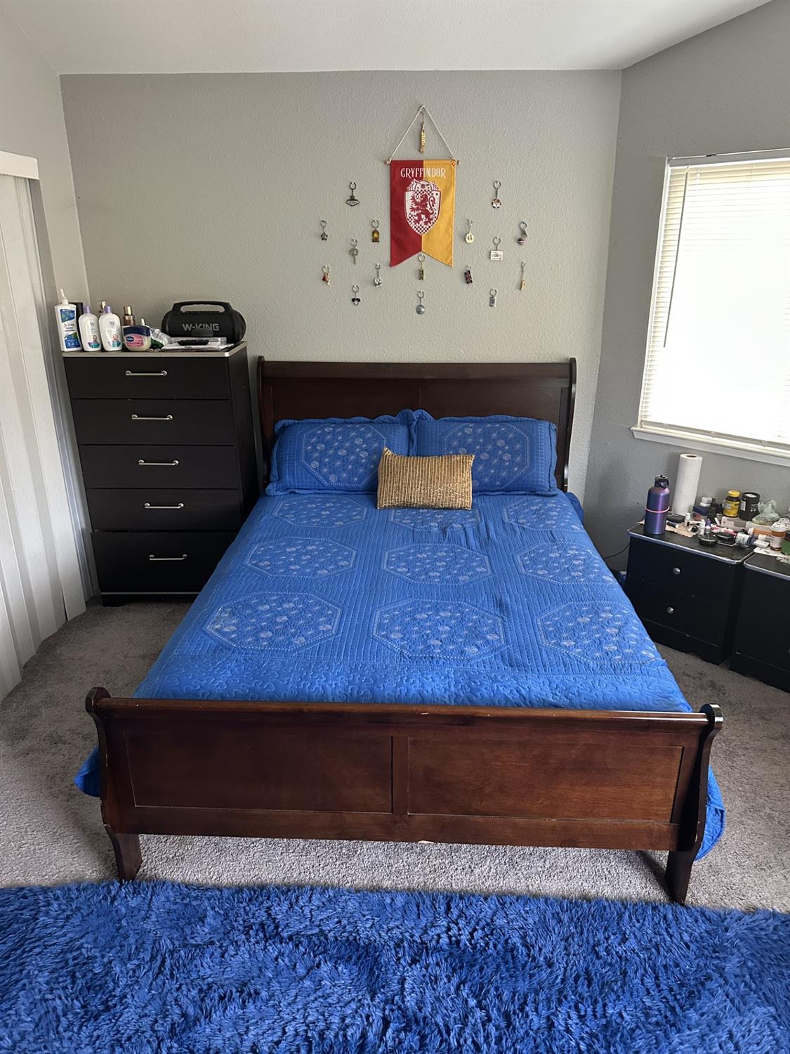 5723 Larcom Lane Stockton, CA 95210 - Photo 21 of 22 a bed sitting in a bedroom next to a window