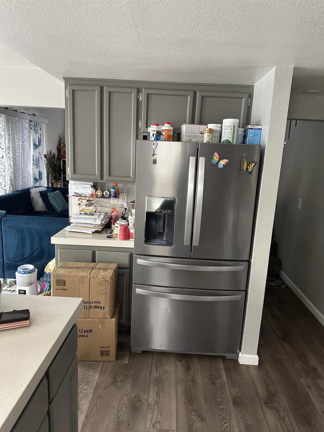 5723 Larcom Lane Stockton, CA 95210 - Photo 9 of 22 a kitchen with a refrigerator sink and cabinets