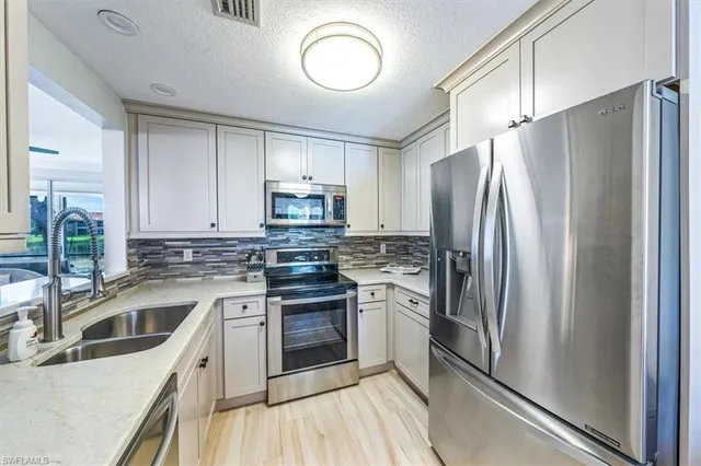 $469,500 | 2540 Aspen Creek Lane, Unit 101, Naples, FL 34119