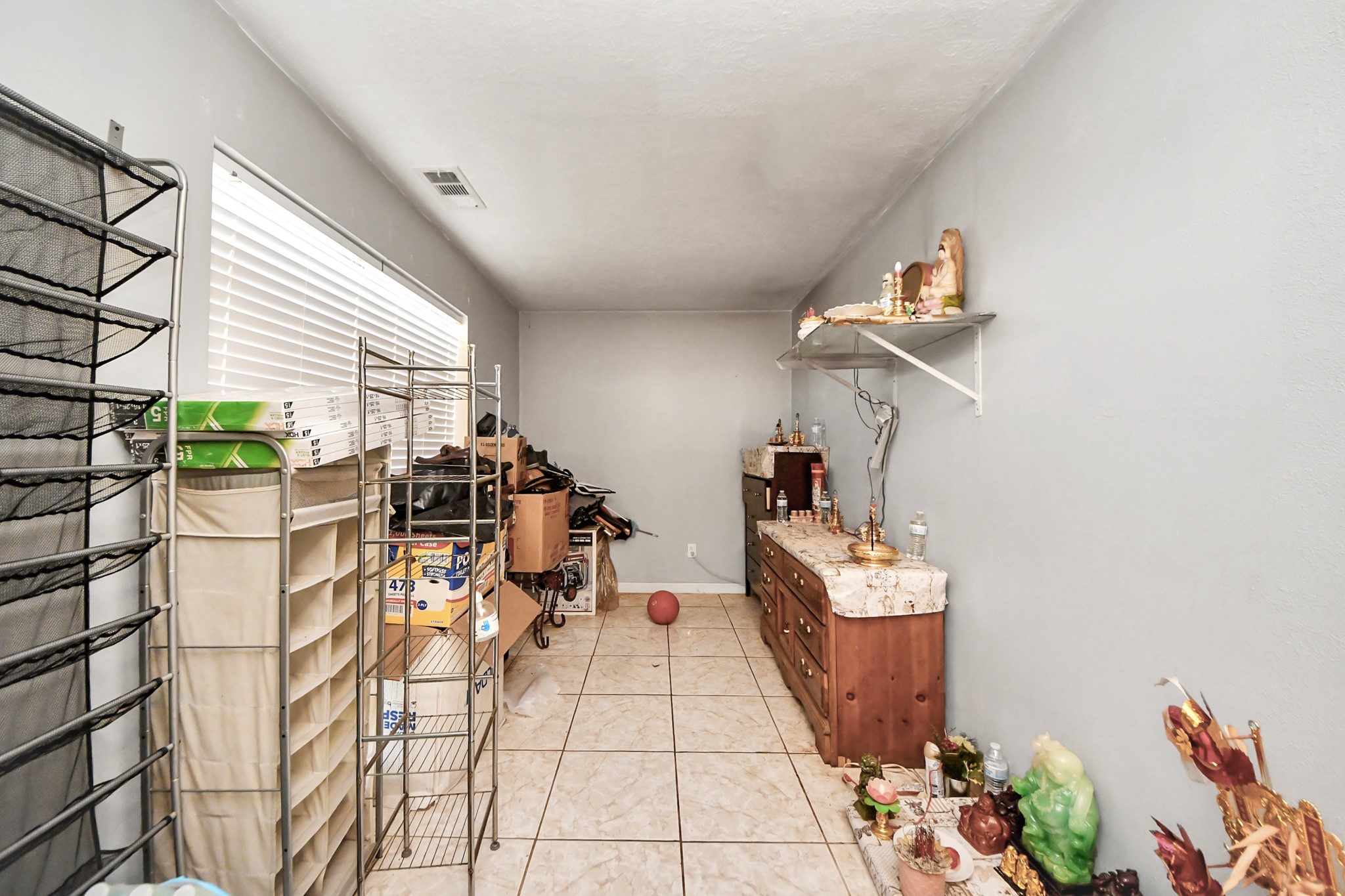 14119 Renn Road Houston, TX 77083 - Photo 31 of 43 a balcony with chairs and potted plants
