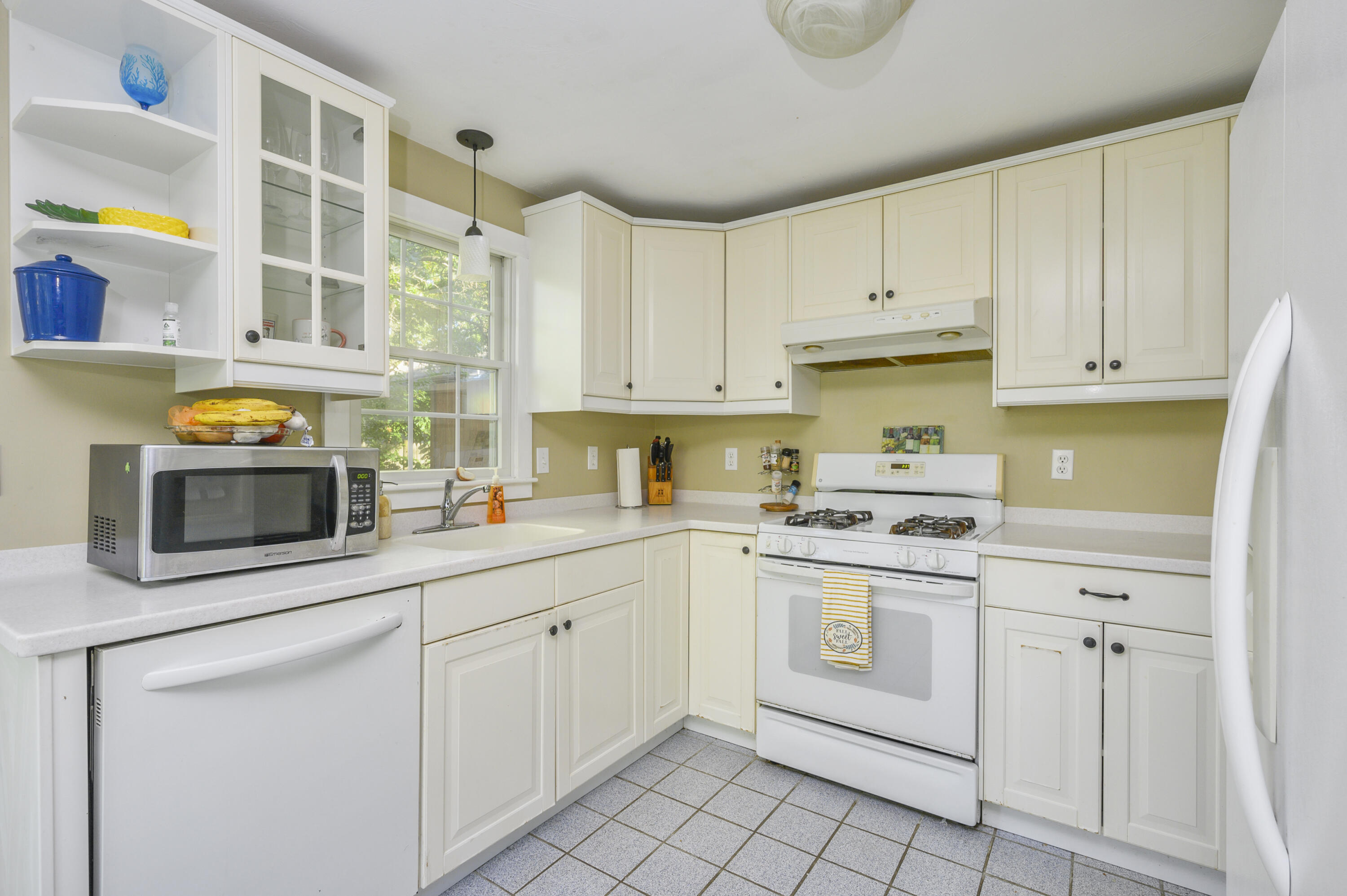52 Zeno Crocker Road Centerville, MA 02632 - Photo 8 of 20 a kitchen with stainless steel appliances granite countertop a stove and a sink