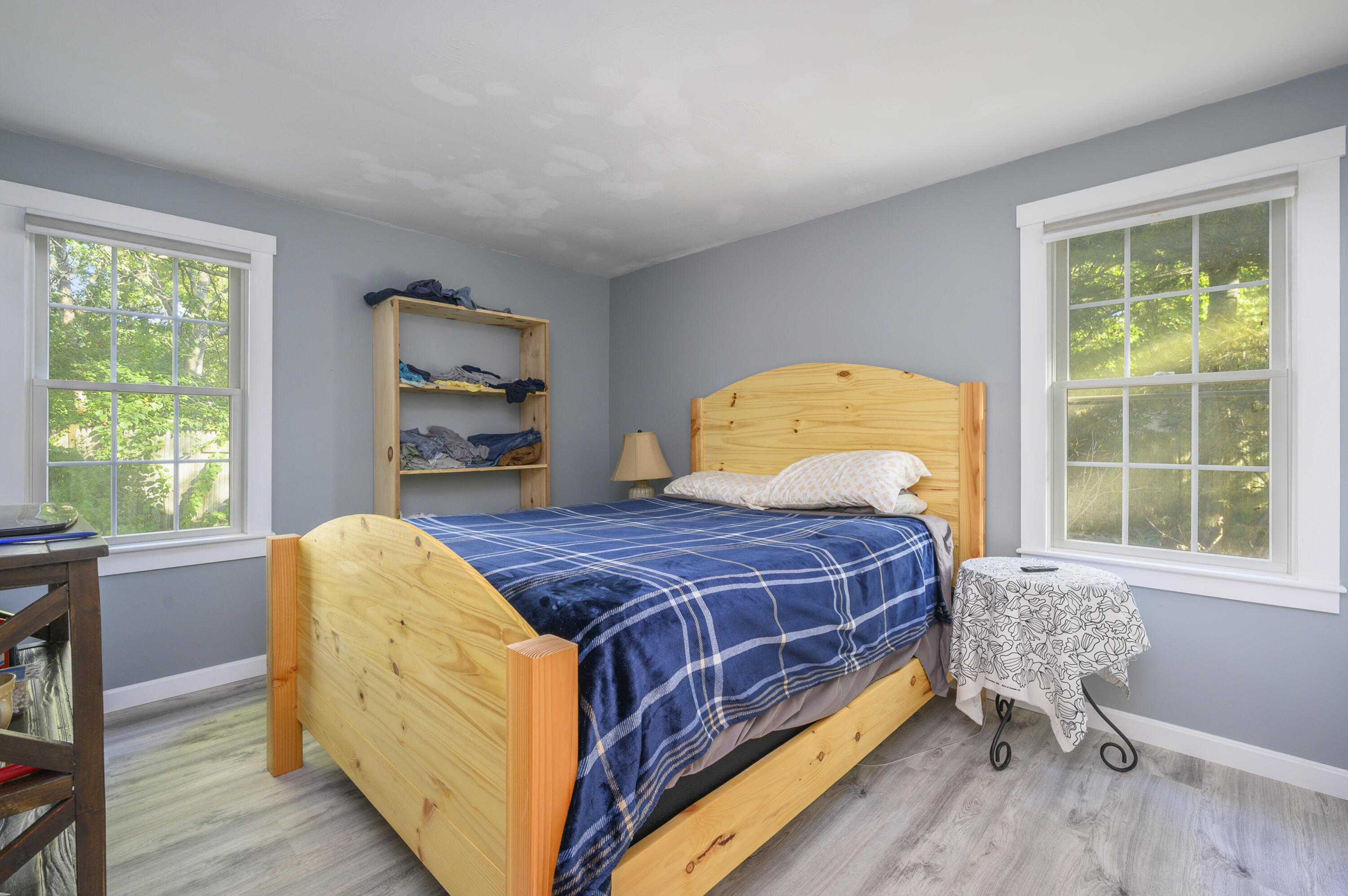 52 Zeno Crocker Road Centerville, MA 02632 - Photo 10 of 20 a bed sitting in a bedroom next to a window