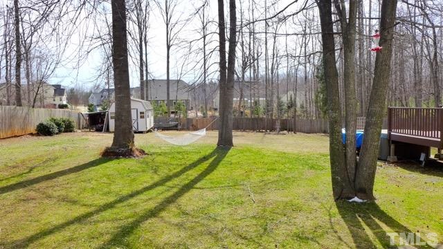 7714 York Loop Road Mebane, NC 27302 - Photo 14 of 16 The yard is big, flat, and pretty. Fantastic garden areas are yours!
