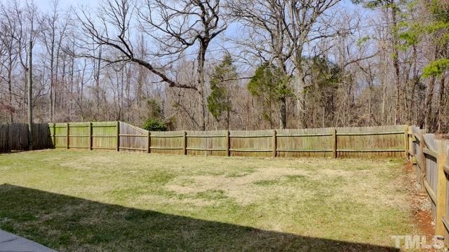 7714 York Loop Road Mebane, NC 27302 - Photo 3 of 16 The front yard is fully fenced! Great space here. And you face woods across the road.