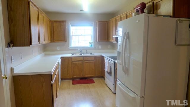 7714 York Loop Road Mebane, NC 27302 - Photo 8 of 16 The Kitchen offers great counter and cabinet space, and updated appliances and flooring.