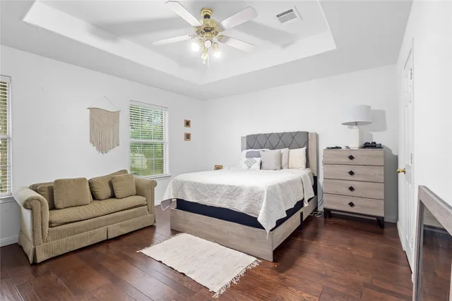 a bathroom with a sink vanity and mirror
