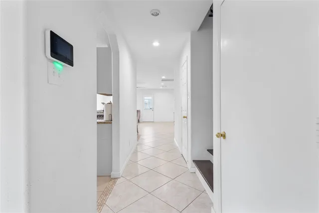 a kitchen with stainless steel appliances granite countertop a sink and a stove