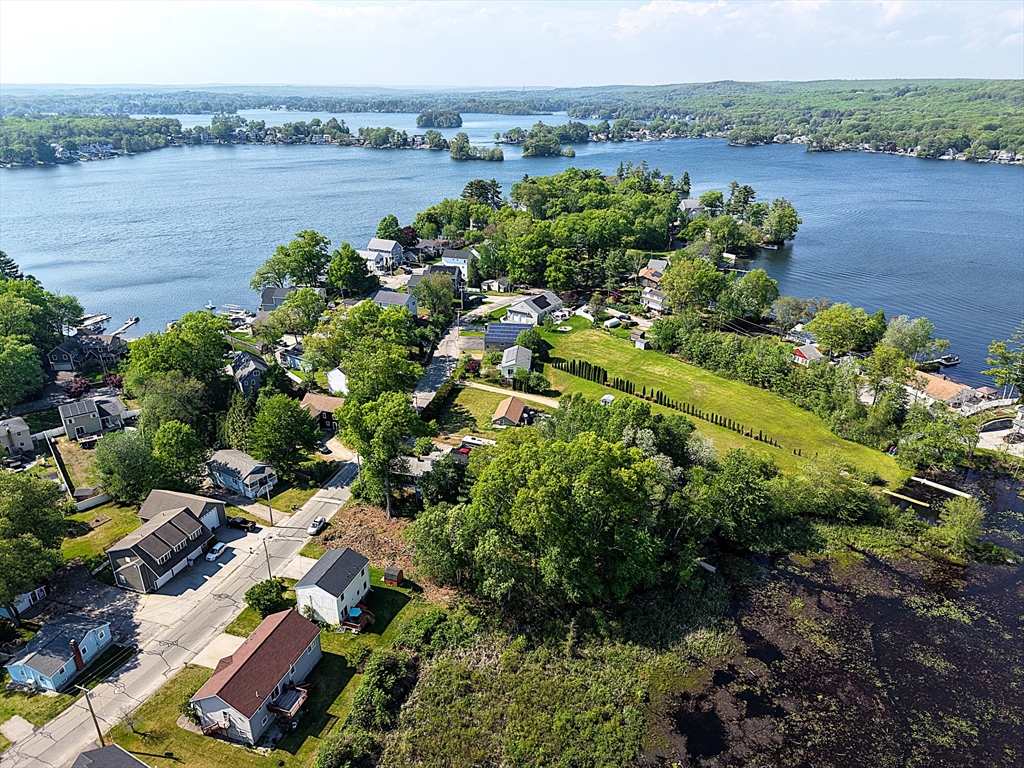 16 Black Point Road Webster, MA 01570 - Photo 14 of 14 a view of a lake with a house