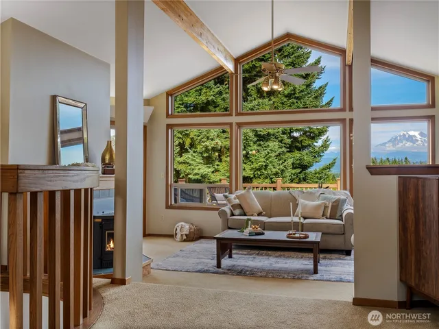 a view of a dining room with furniture window and outside view