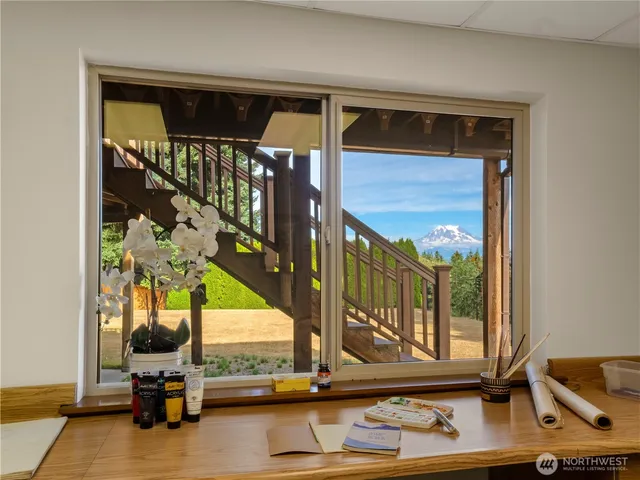 a bedroom with a bed and dresser